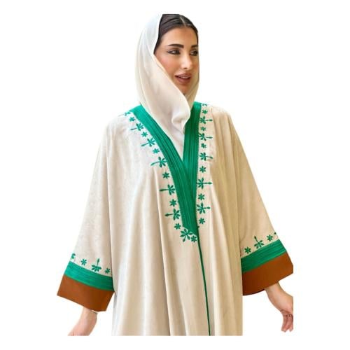 Traditional abaya with touches of the past and colors of nature