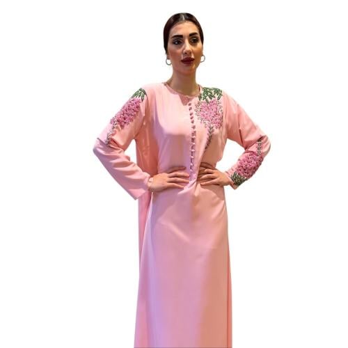 Light pink crepe dress decorated with stones and crystals.