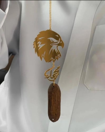 تعليقة الصقر بكسرة العود