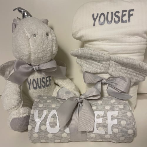 بكج هديه عباره عن بطانيه وفوطه ودميه