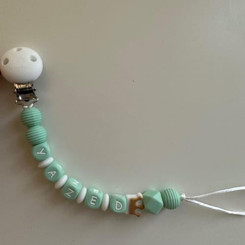 تعليقه مصاصه بالاسم بنفس شكل الصوره