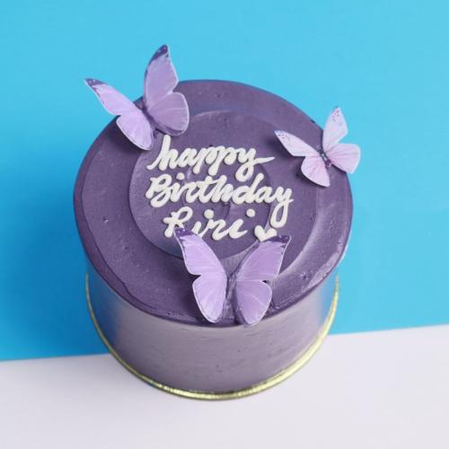 كوري كيك Happy .b .d مع لون بنفسجي وفراشات