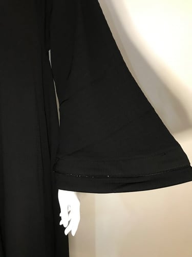 عباية كلوش كُم واسع