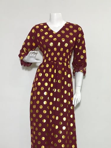 جلابية باللون العودي المذهب