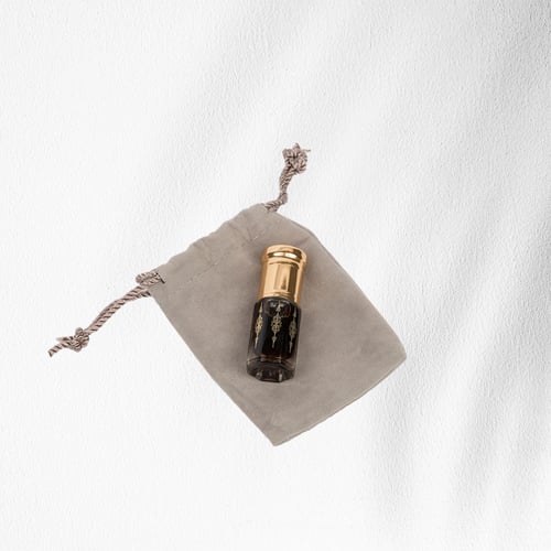 ربع توله من اجود انواع دهن العود والعنبر 12 عبوه