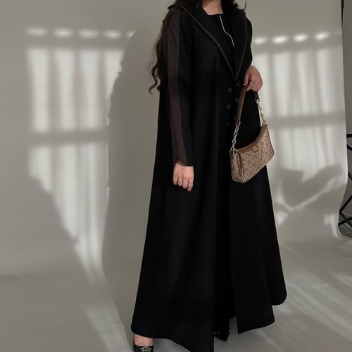 عباية كلوش اسود مع بني القماش كتان