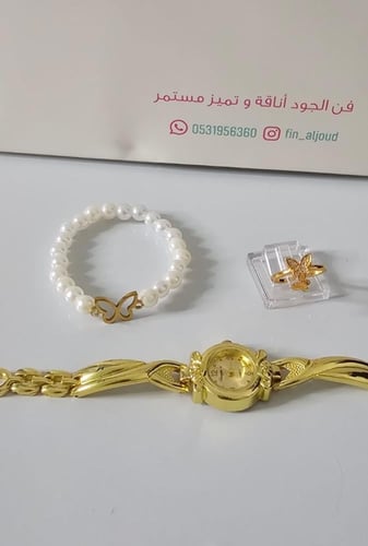 طقم الفراشه ساعه مع ساعه ذهبيه واسورة لؤلؤ فراشه