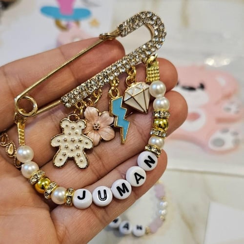 هدية مواليد تعليقة لهايه وبروش واسوره وعضاضه