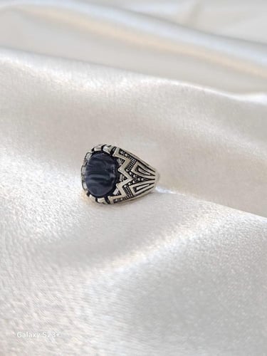 خاتم أطفال أسود رخامي