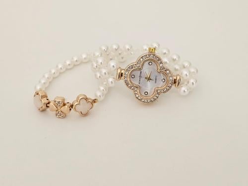 ⌚ ساعة لؤلؤية فاخرة – تصميم يدوي مستوحى من فان كلي...