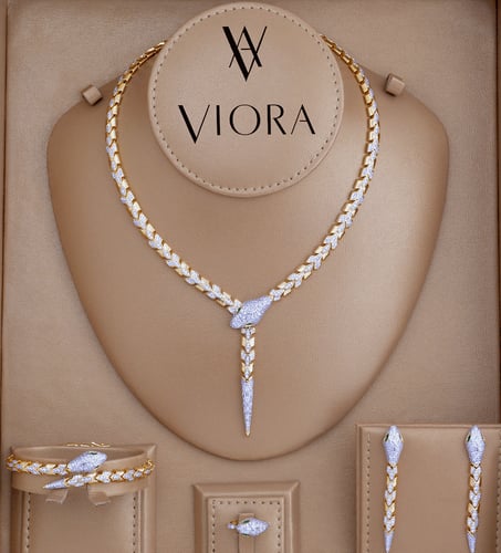 Zircon set with diamond design