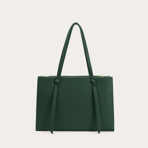 شنطة نسائية بمقاس كبير باللون الاخضر