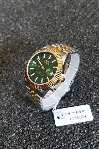 ساعة رجالية بتصميم كلاسيكي باللونين ميناء اخضر مقا...