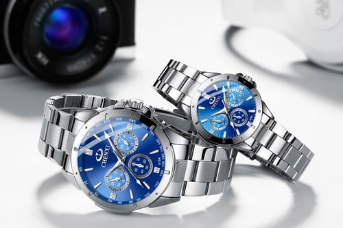 طقم ساعات الزوجين رجالية ونسائية باللون الفضي والأ...