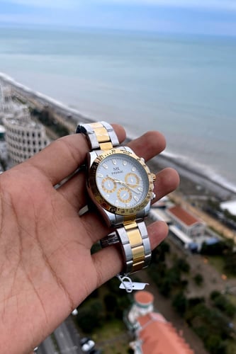 ساعة رجالية باللونين ميناء أبيض