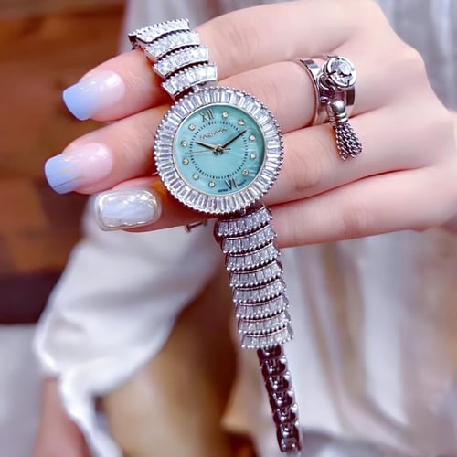 ساعة نسائية فضي ميناء فيروزي بفصوص الزركون شبيه ال...