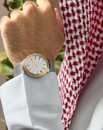 ساعة رجالية بسوار ستانلس ستيل بلون فضي ذهبي