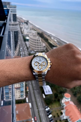 ساعة رجالية باللونين ميناء أبيض