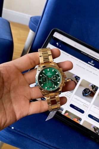 ساعة رجالية باللون الذهبي والأخضر