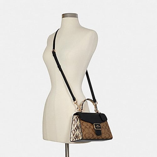 كوتش بيبر حقيبة بنقش جلد الثعبان