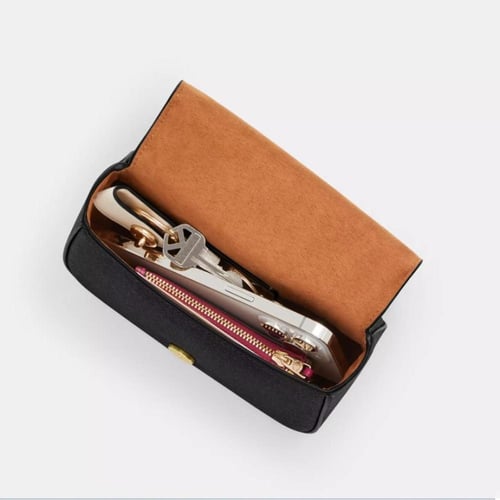 شنطة كوتش توب ليزي عنابي