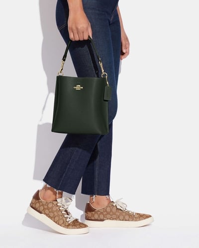 شنطة كوتش باكت مولي زيتي