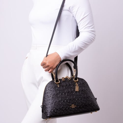 شنطة كاتي من كوتش بلوقو بارز اسود