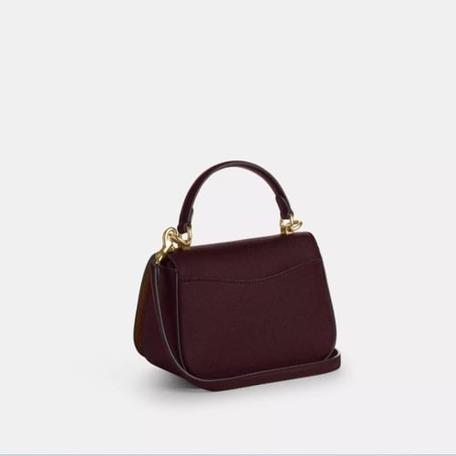 شنطة كوتش توب ليزي عنابي