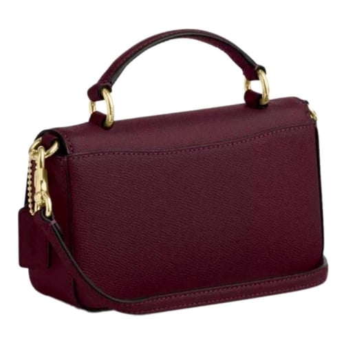 حقيبة كوتش صغيرة من طراز جوزي بمقبض علوي