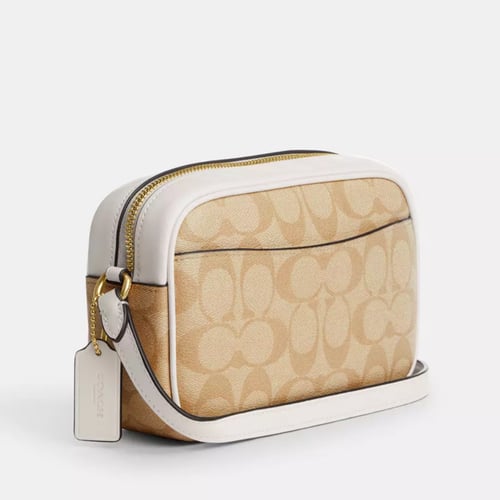 كوتش كروس بدي بسحاب ابيضّ وقلب وردي