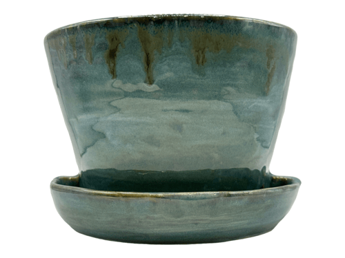 إصيص نبتة/ مسند كتاب