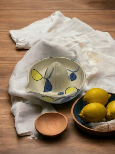 عصارة ليمون يدوية