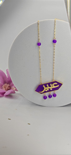 عقد تصميم علي اسم حجر اكرليك موف