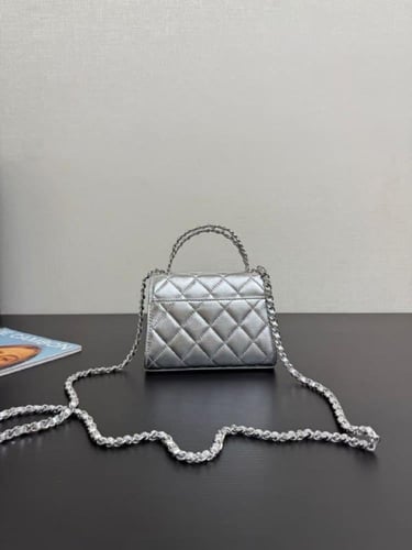 شنطة كلاتش كيلي الفضية بسلسلة ربيع - فضي