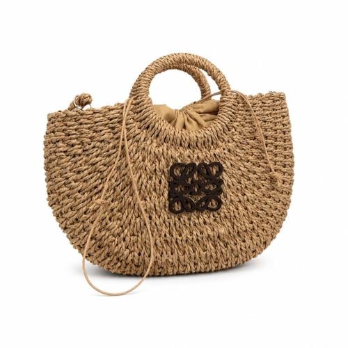 Louis Vuitton straw women's bag with Anagram logo