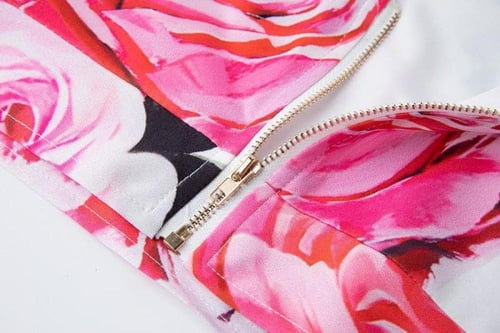 طقم من توب قصير وتنورة طويلة بنقشة الورود من دولتش...