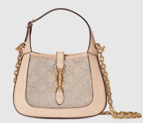 حقيبة قوتشي شفافة بتفاصيل ذهبية