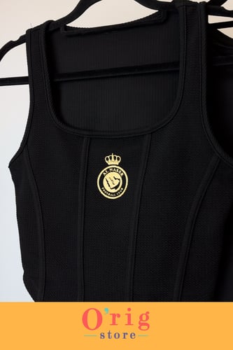 توب نسائي بشعار نادي النصر