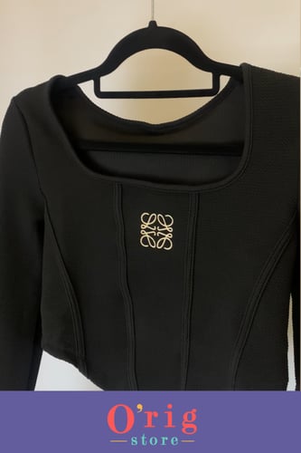 توب نسائي كم طويل بشعار لويفي