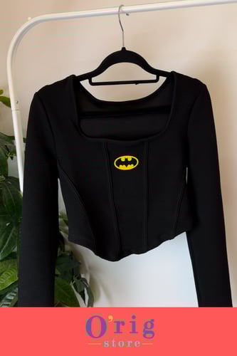 توب نسائي كم طويل بشعار باتمان