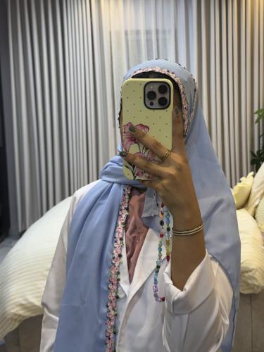 طرحة بلون السماوي
