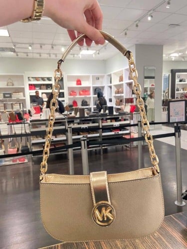 شنطة مايكل كورس ذهبي shoulder bag