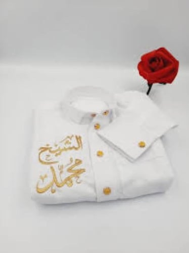 تطريز على ثياب الاطفال