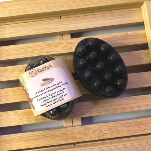 شامبو صلب بخلاصة نواة التمر وزيت جوز الهند بمساج م...