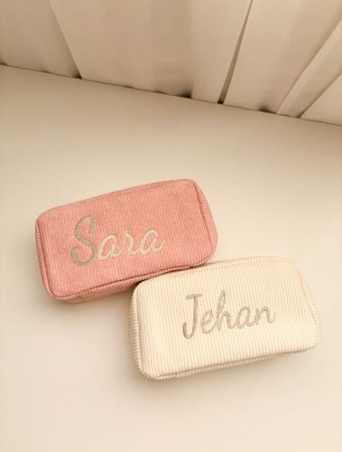 شنطة مطرزه بالأسم