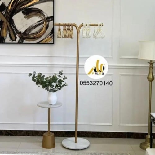 استاند عبايات رخام ذهبي