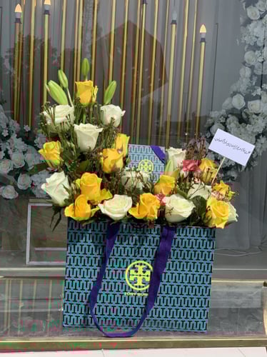 تنسيق مجموعه هدايا على كيس توري بورش