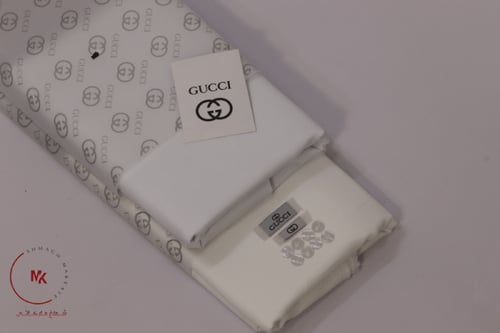 قماش قوتشي ابيض أوكريمي