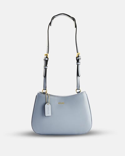 شنطة بلون أزرق بحجم صغير لكل يوم