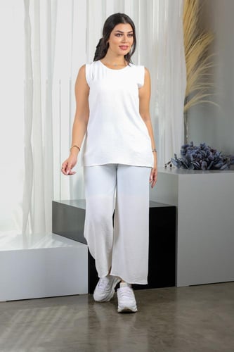 طقم نسائي كاجوال سادة توب طويل بدون أكمام